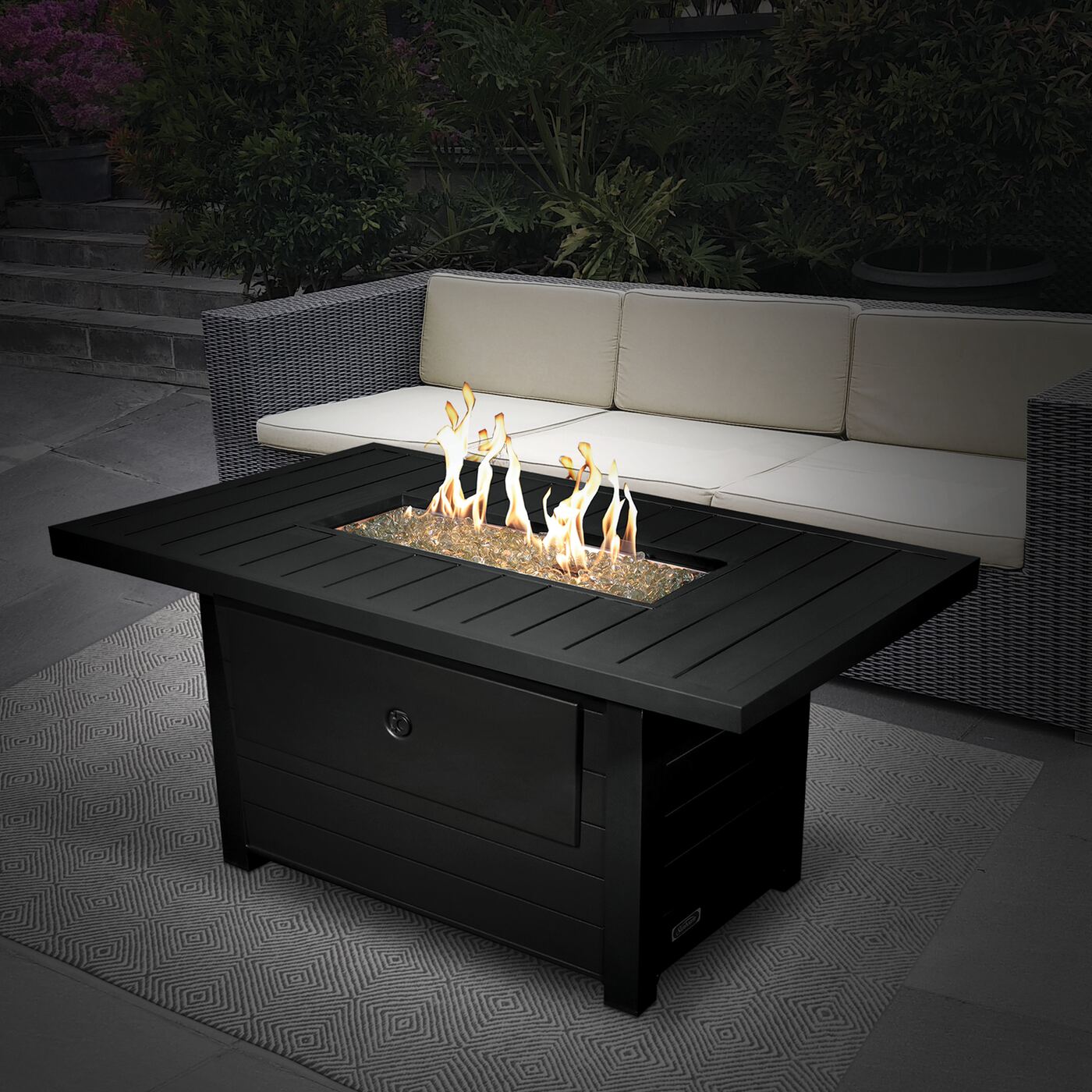 Sunbeam Serenity Fire Pit/Table lit at night